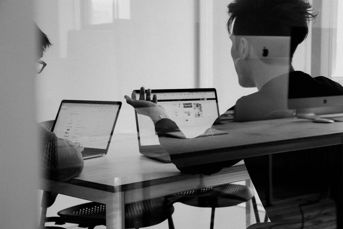 Two colleagues reviewing campaign results together
