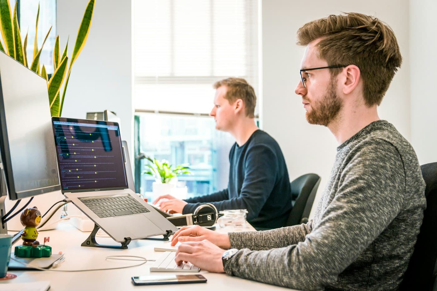 A sales team reviewing lead data and campaign results on screen