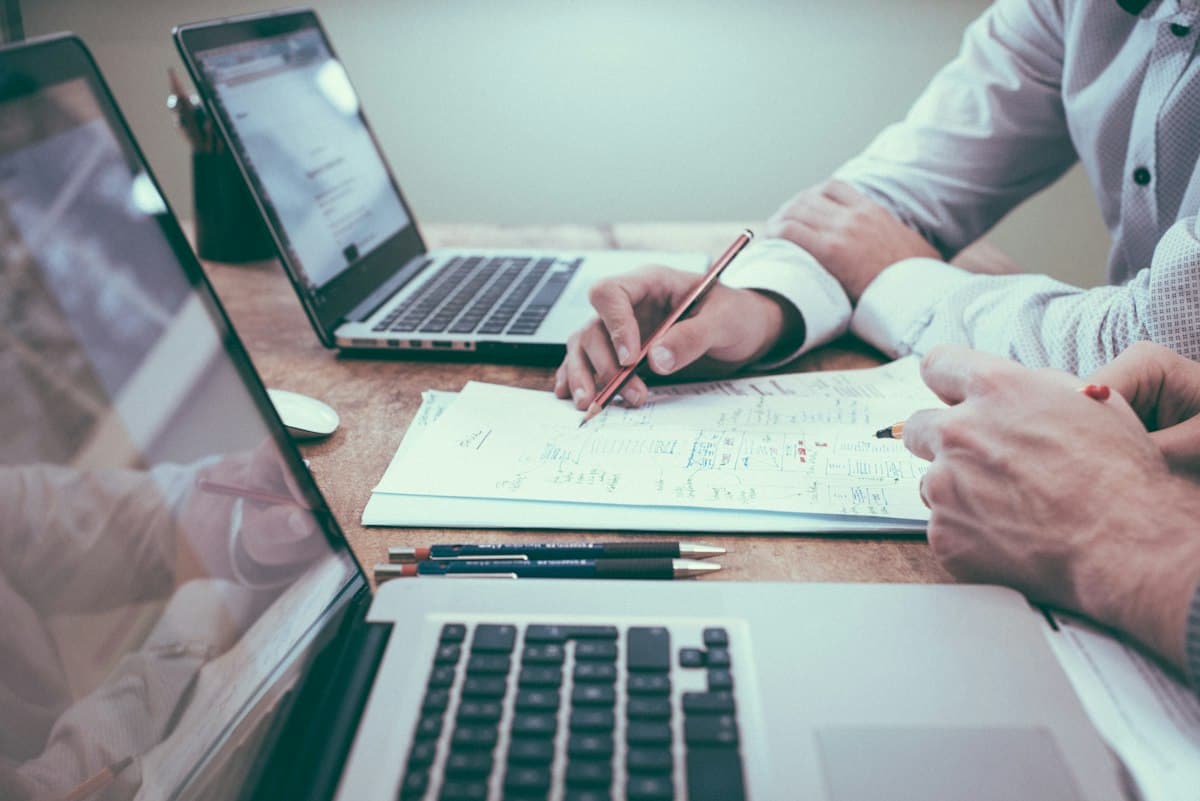 Business planning with budget notes and documents